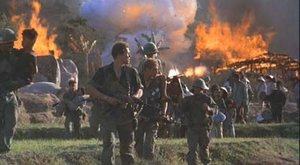 A scene from Platoon Elias contemplates the torching of the village.