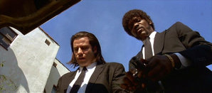John Travolta (left) and Samuel L. Jackson as Vincent Vega and Jules Winnfield, respectively.