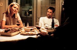 Gwyneth Paltrow, Brad Pitt and Morgan Freeman in a scene