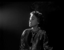 Sunset Boulevard is notable for the atmospheric film noir cinematography of John F. Seitz.  In this scene Norma Desmond is dramatically lit by a movie projector.