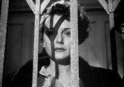 Astor's elevator ride down with police at the end of The Maltese Falcon symbolic of a final trip to hell
